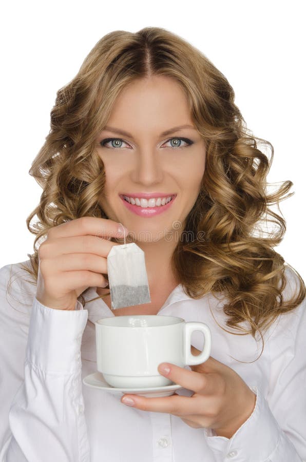 Tea bag in a female hand. stock image. Image of product 36293285