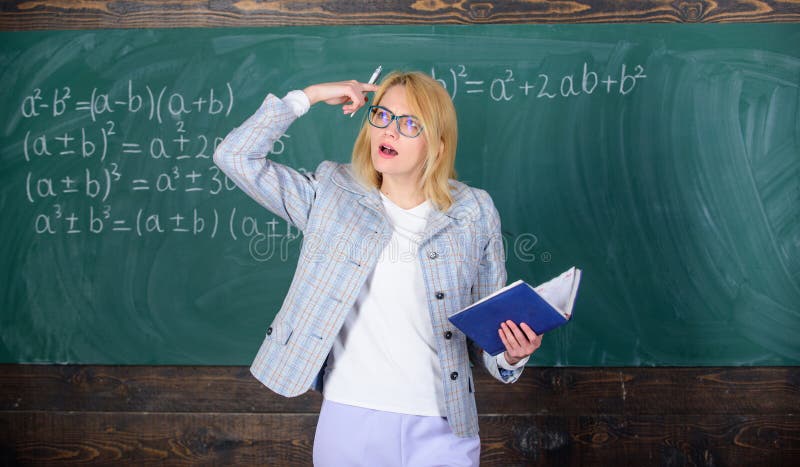 Woman teaching near chalkboard. Effective teaching involve acquiring relevant knowledge about students. What make great stock images