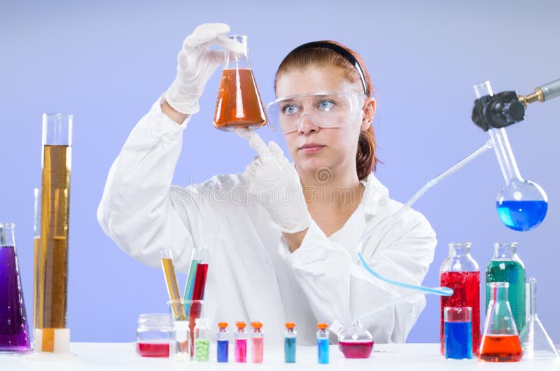 Woman with test tubes in a chemistry stock photo