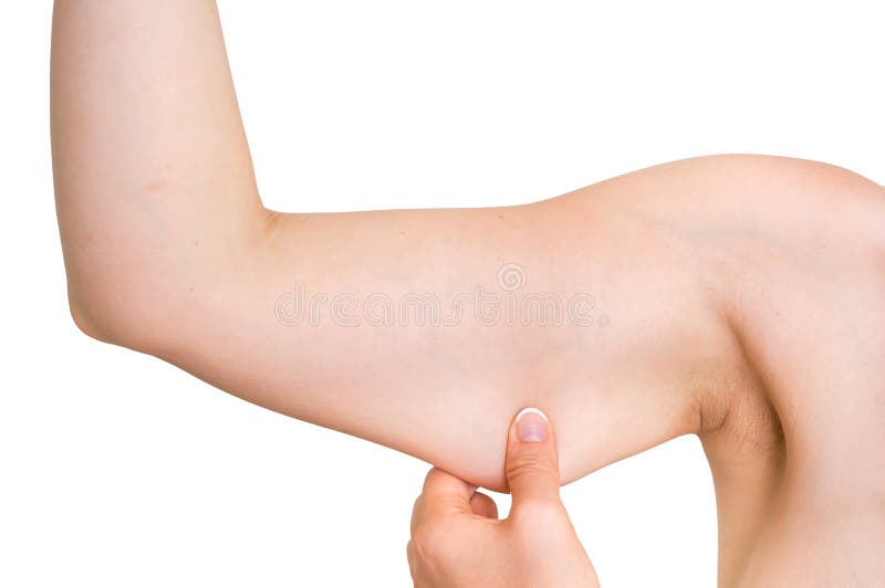 Woman is testing her muscle under her arm - healthcare fit and diet concept