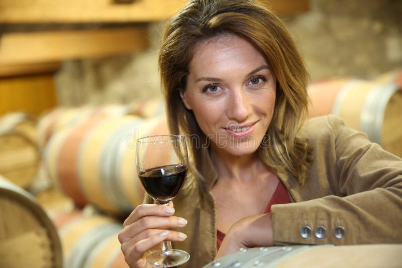 Woman testing the red wine