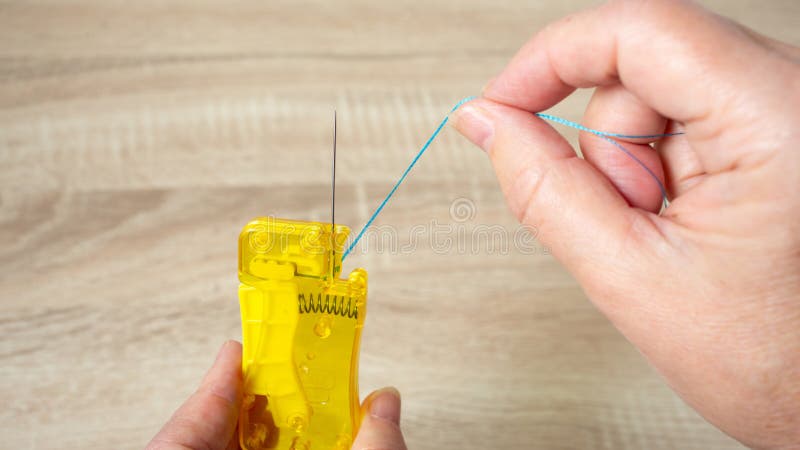 170+ Needle Threader Stock Photos, Pictures & Royalty-Free Images - iStock