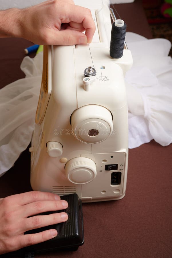Woman Threading on Sewing Machine Stock Photo Image of pattern