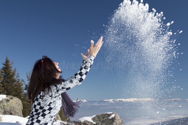 Woman Throwing Snow in the Air in Winter Stock Image Image of