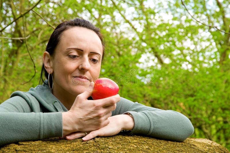 Woman about To Eat an Apple Stock Photo Image of fruit, holding 24346076