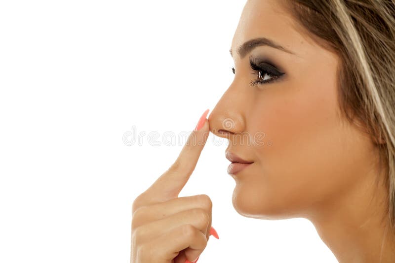 Woman touching her nose