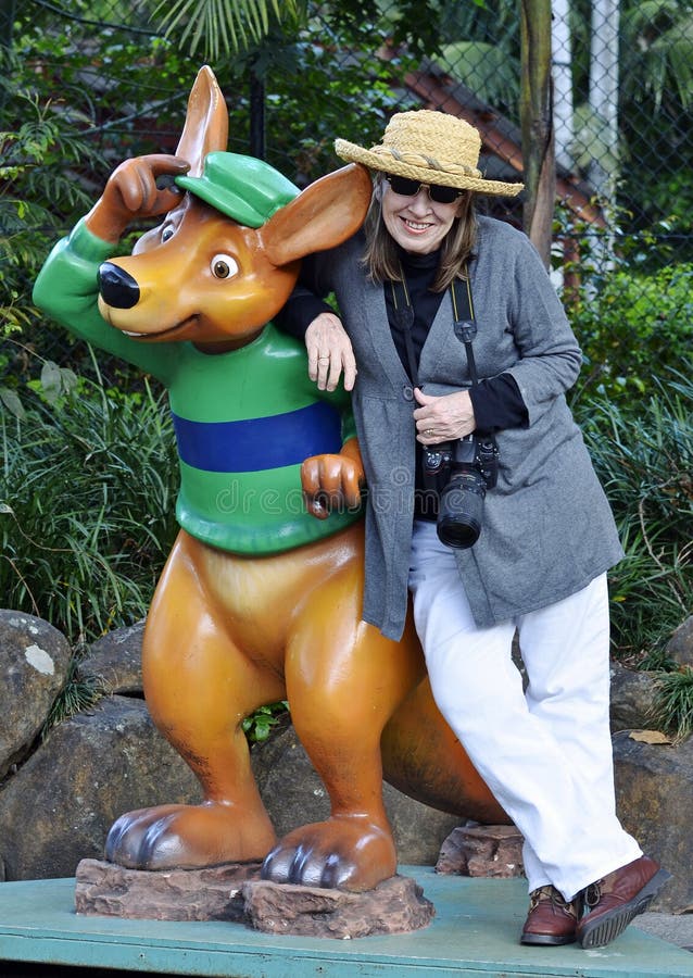 Woman tourist posing with kangaroo statue Gold Coast, Australia stock image Woman tourist posing with kangaroo statue Gold Coast, Australia stock image