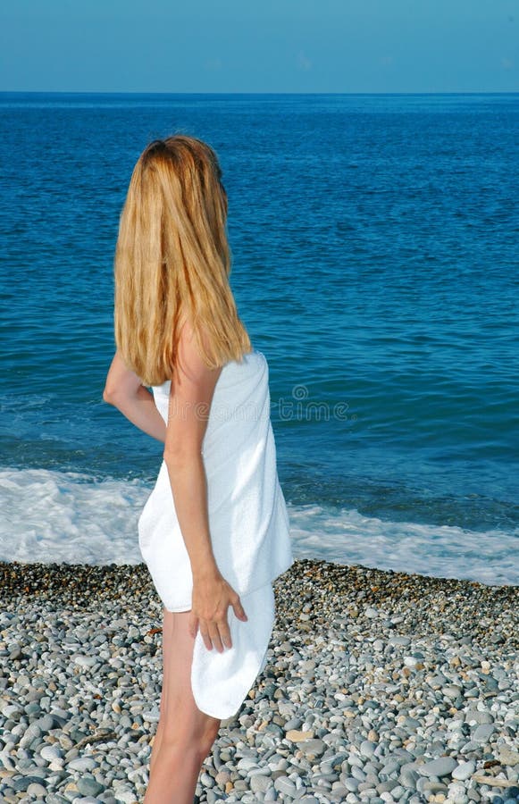 Woman in a Towel on a Beach Stock Photo Image of hair, summer 10611630