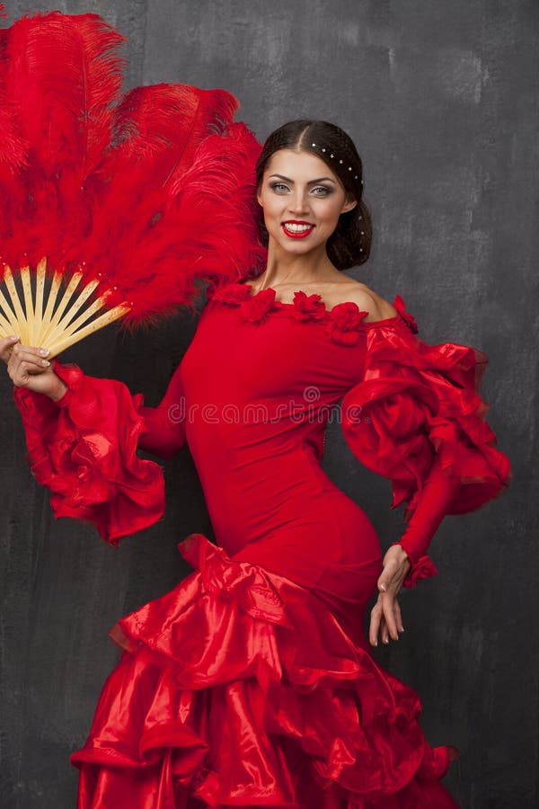 Woman Traditional Spanish Flamenco Dancer Dancing In A Red Dress Stock