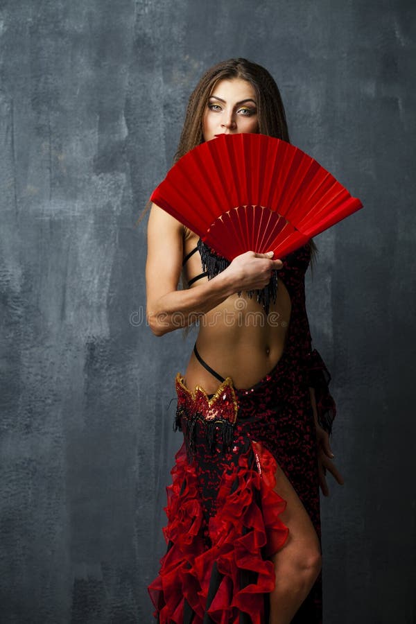 Woman Traditional Spanish Flamenco Dancer Dancing In A Red