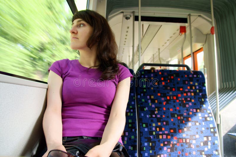 Woman in tram, trolley, streetcar, tramway