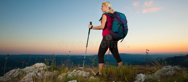 Woman on Trekking - Beautiful Blonde Girl Hiking on Mountains Stock ...