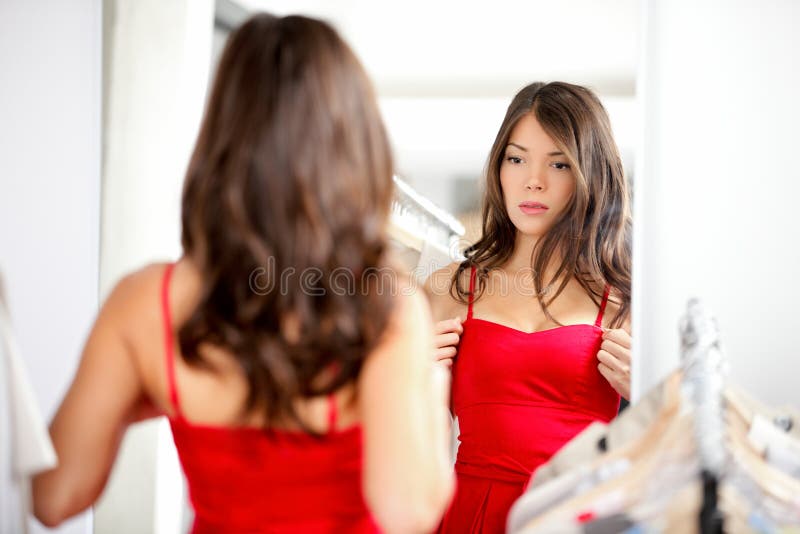 Woman trying clothing royalty free stock photos Woman trying clothing royalty free stock photos