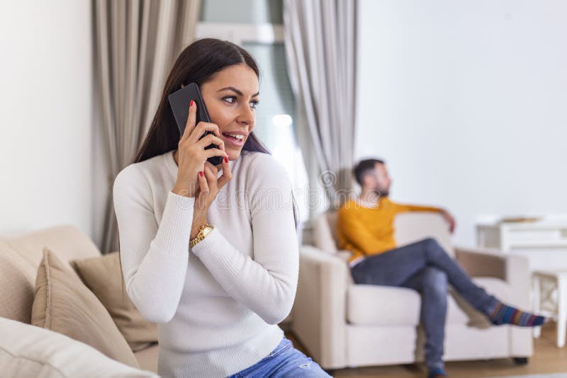 Woman Turned Her Back To Man, Talking on Phone with Her Lover ...