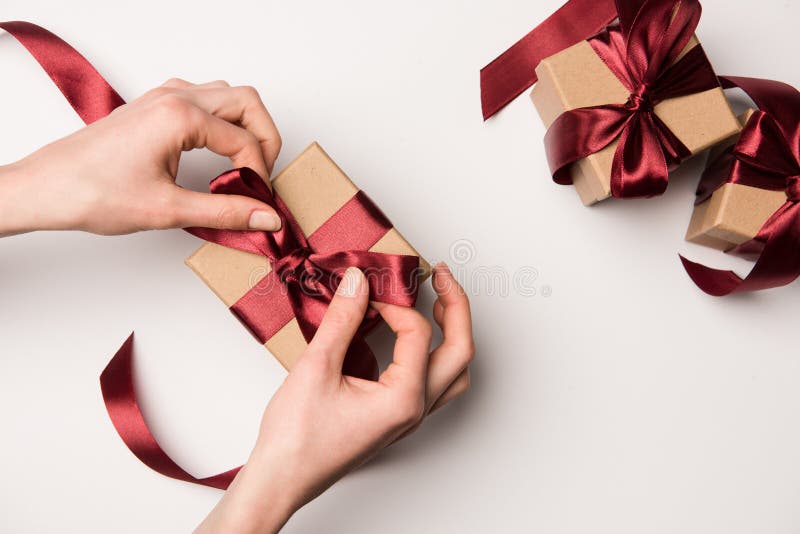 Woman Tying Ribbon on Gift Box Isolated on White Stock Photo Image of woman, hands 107732106