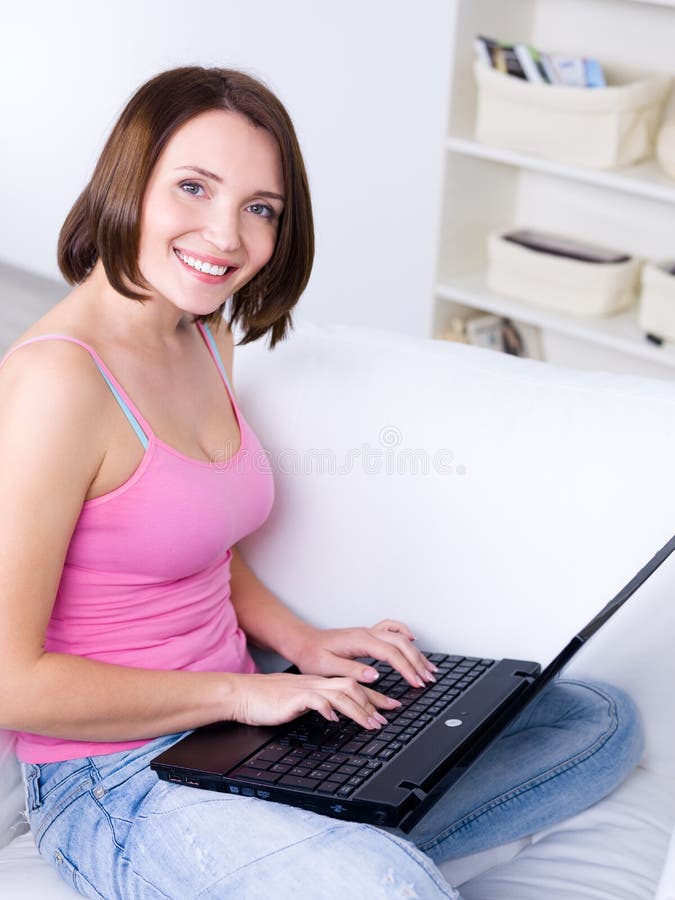 Woman typing on laptop stock photo. Image of female, room - 18129806