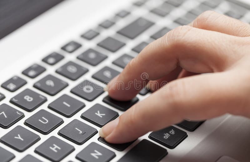 Woman typing on laptop royalty free stock photos