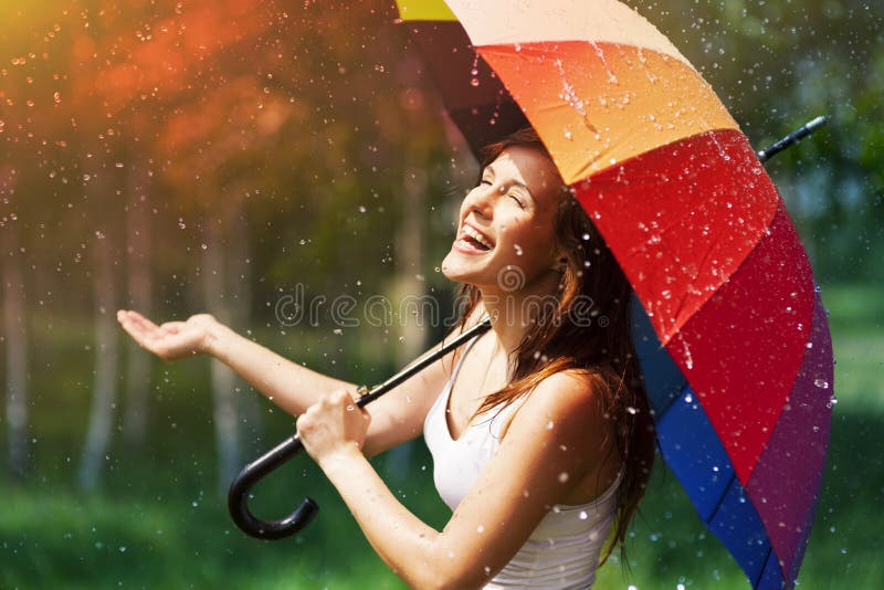 Woman with umbrella stock photos
