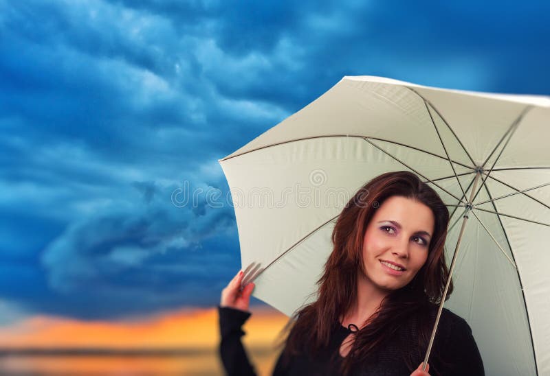 Woman with umbrella in a rainy day