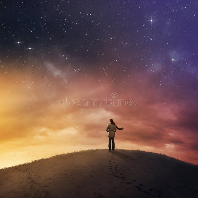 Woman under night sky. royalty free stock image