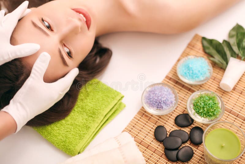 Woman Under Professional Facial Massage In Beauty Spa Stock Image Image Of Health Candle