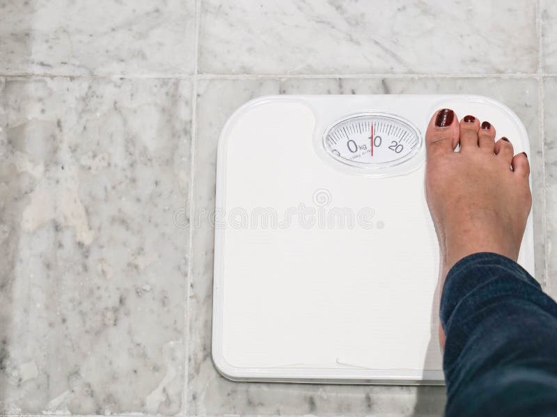 Woman use wieght scale