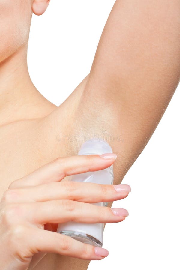 Woman uses deodorant, isolated on white background