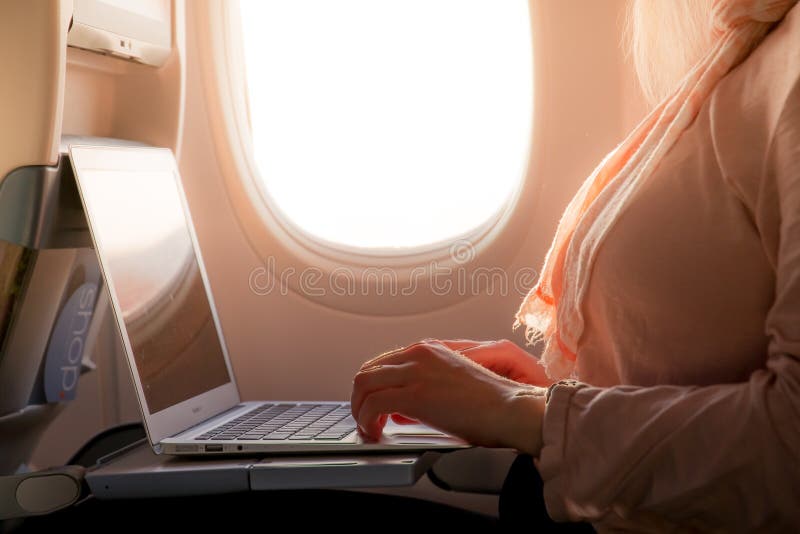Girl Working on Laptop in Airplane Stock Image Image of flight, flying 155326409