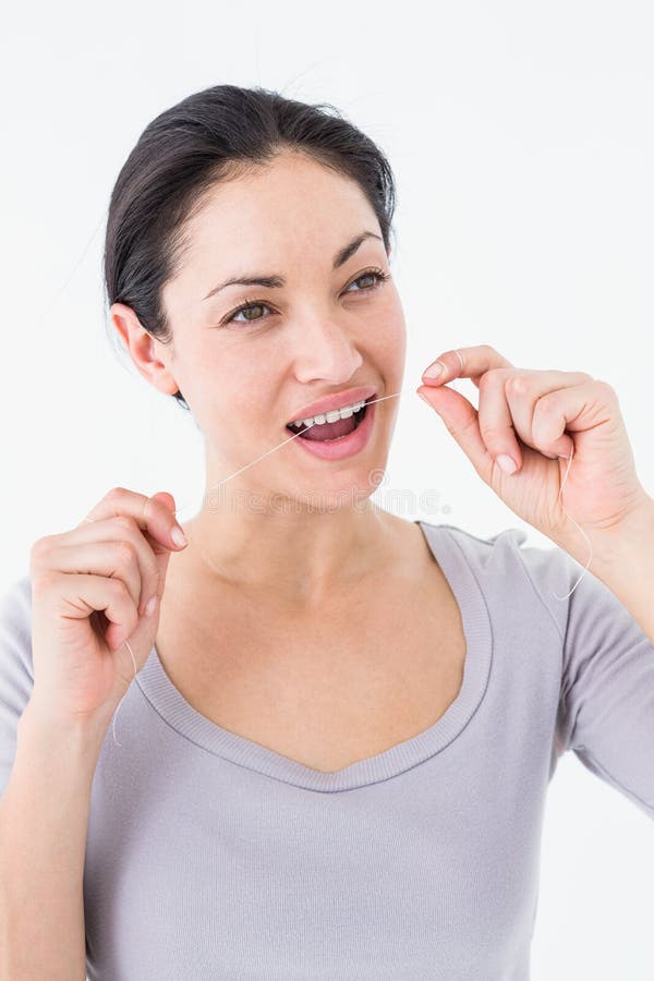 Woman using dental floss stock image. Image of hair, happy 53048569