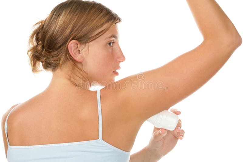 Portrait of young woman using deodorant isolated on white background, back view.