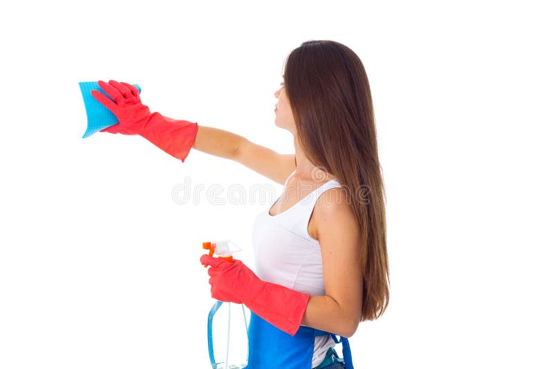 Woman using duster and detergent