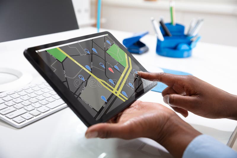 Woman Using GPS Navigation Map On Digital Tablet royalty free stock photo