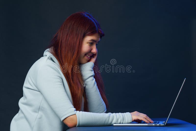 Woman is using laptop for communication in chat or video chat. Social media concept. royalty free stock images Woman is using laptop for communication in chat or video chat. Social media concept. royalty free stock images