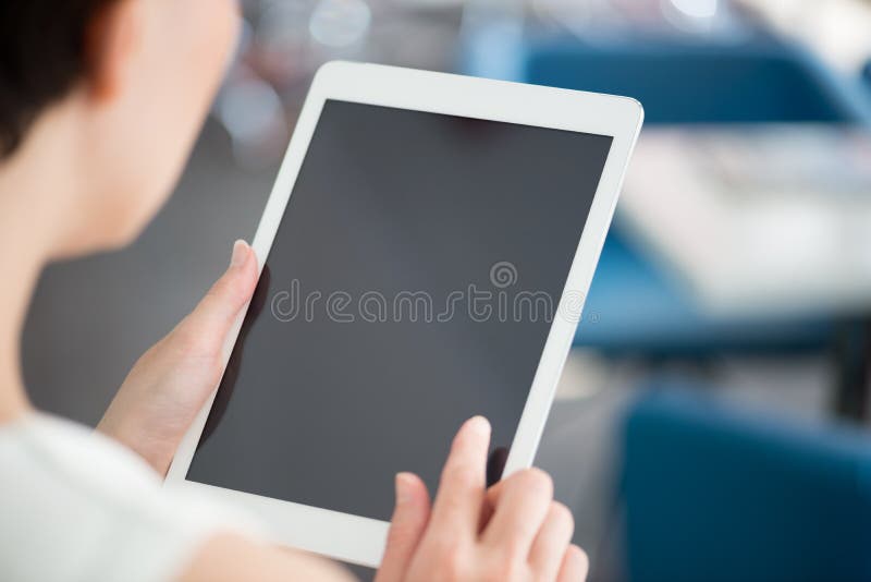 Woman using modern digital tablet royalty free stock image