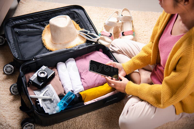 Premium Photo  Woman packing clothes in luggage for new journey