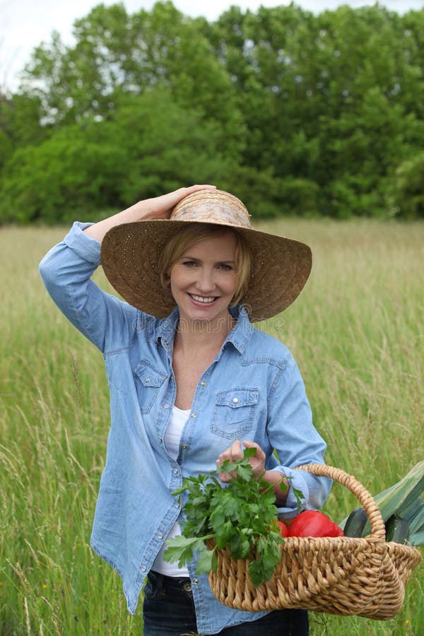 Woman with vegetables basket