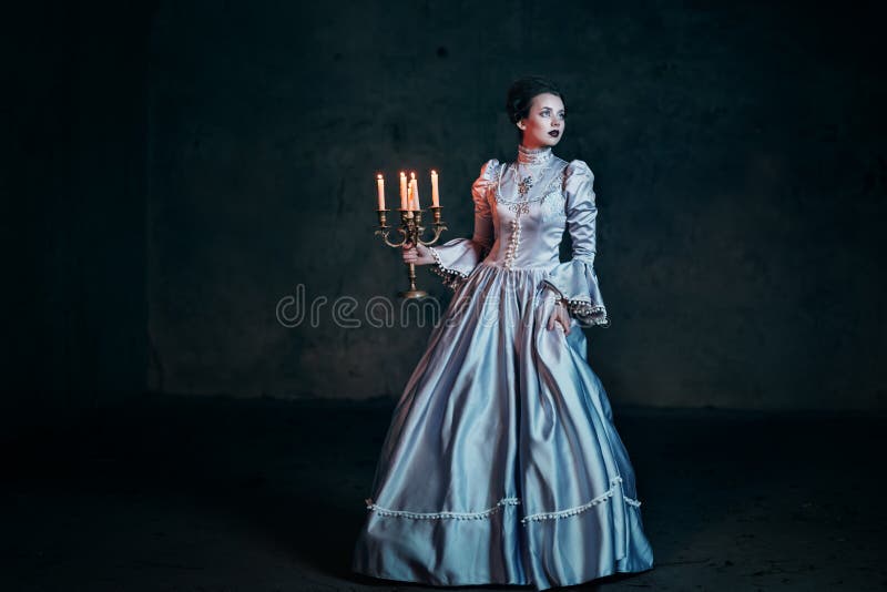 Woman in victorian dress stock photo