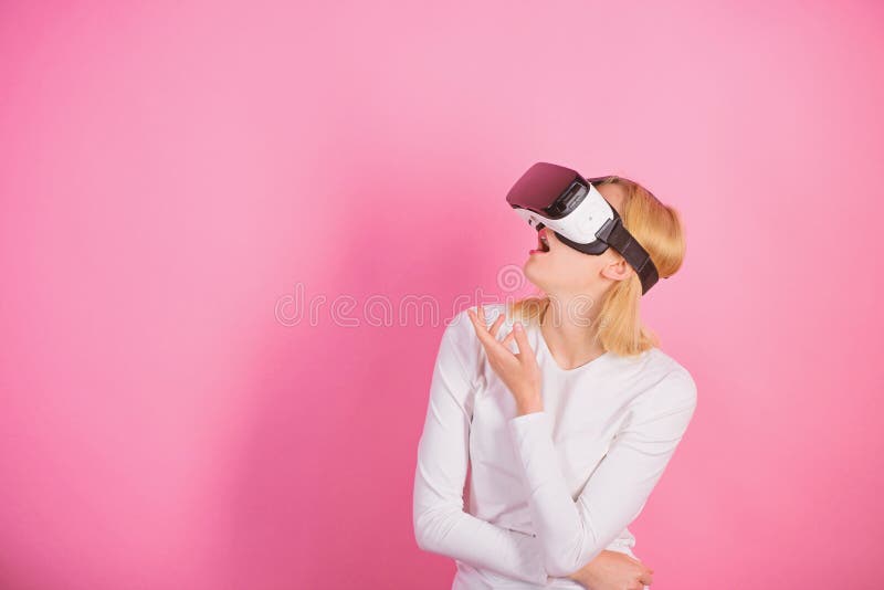 Woman with Virtual Reality Headset. Young Woman Using a Virtual Reality