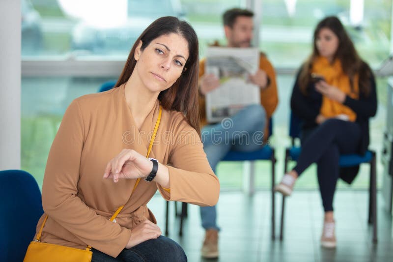 Woman waiting for late interview royalty free stock photos