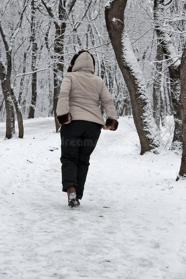 Woman Walking Alone in the Winter Park Outdoor Stock Photo - Image of ...