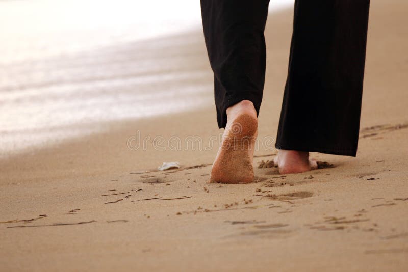 Woman walking on the beach