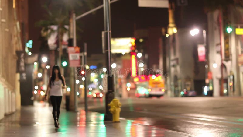 Woman Walking City Street at Night