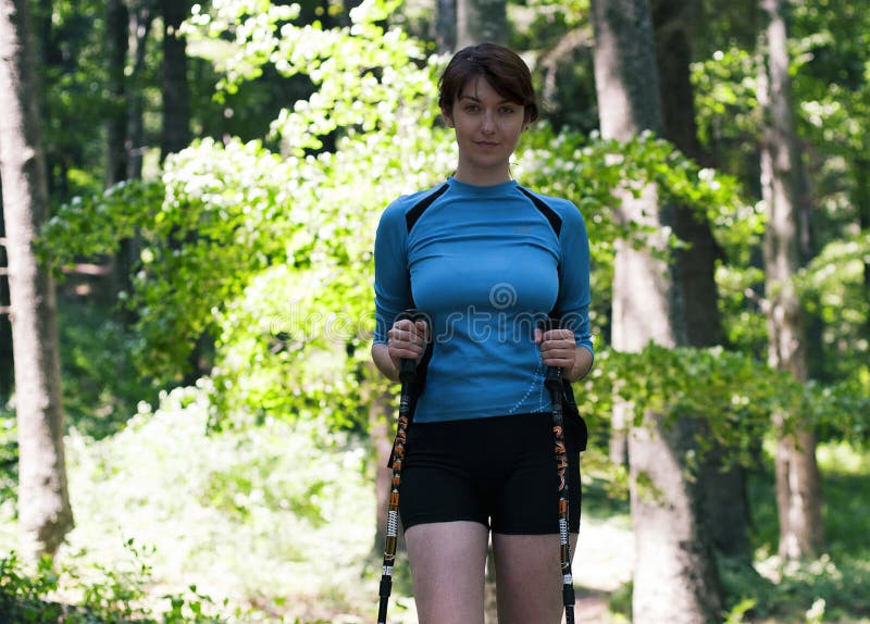 Woman walking in the forest royalty free stock photography Woman walking in the forest royalty free stock photography
