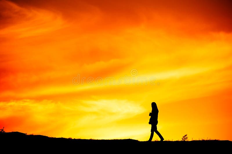 Woman walking, silhouette