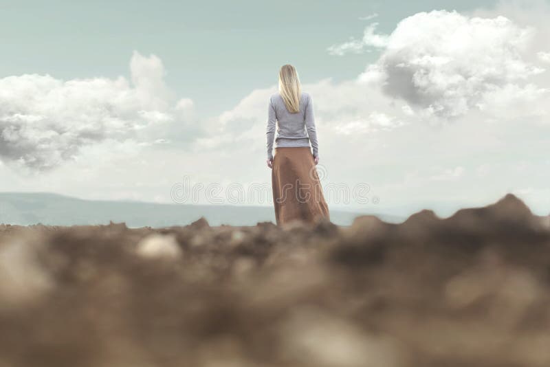 Woman walking towards infinity in a magical and surreal place royalty free stock image Woman walking towards infinity in a magical and surreal place royalty free stock image