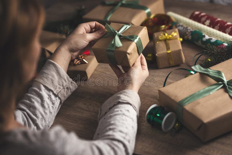 Woman packing Christmas gift stock photos Woman packing Christmas gift stock photos