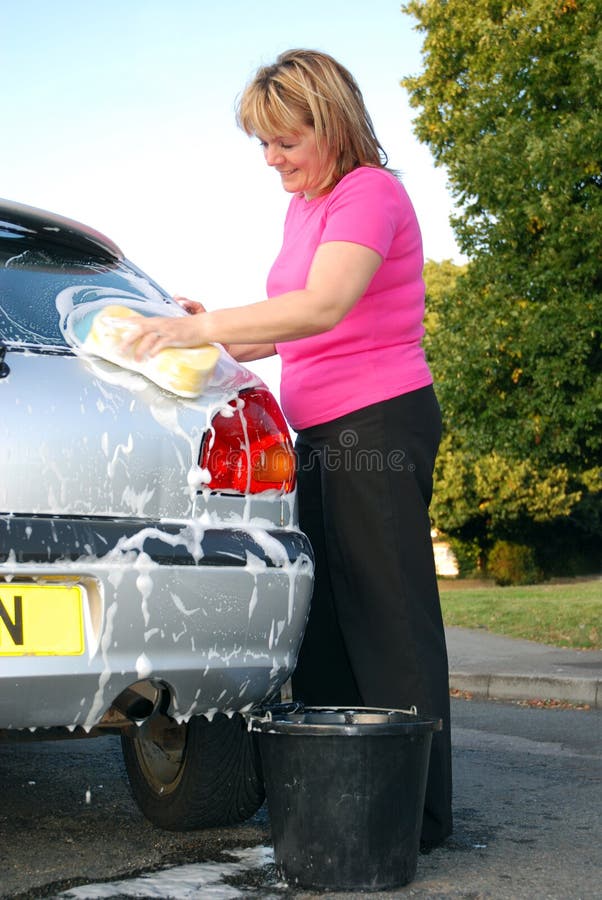 Woman washing car