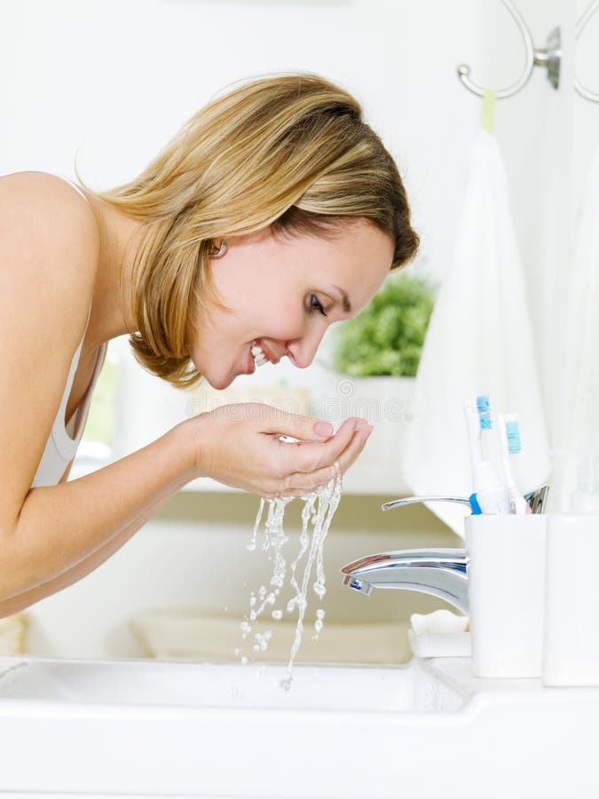 Woman Washing Face with Water Stock Photo Image of adult, profile