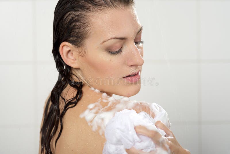 She a shower now. Гель стоковые фото. Woman Washes her grandfather.