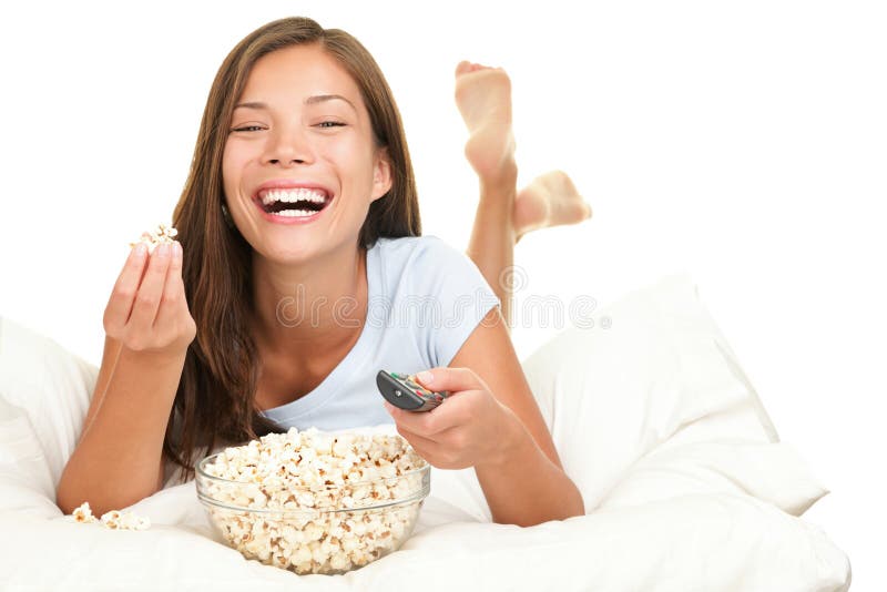 Woman watching funny movie laughing stock photography Woman watching funny movie laughing stock photography